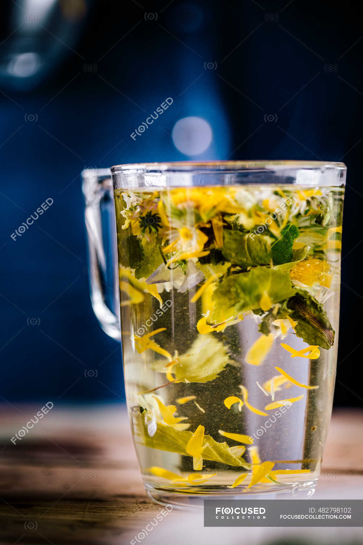 herbal-tea-in-glass-over-table-drink-nutrition-stock-photo