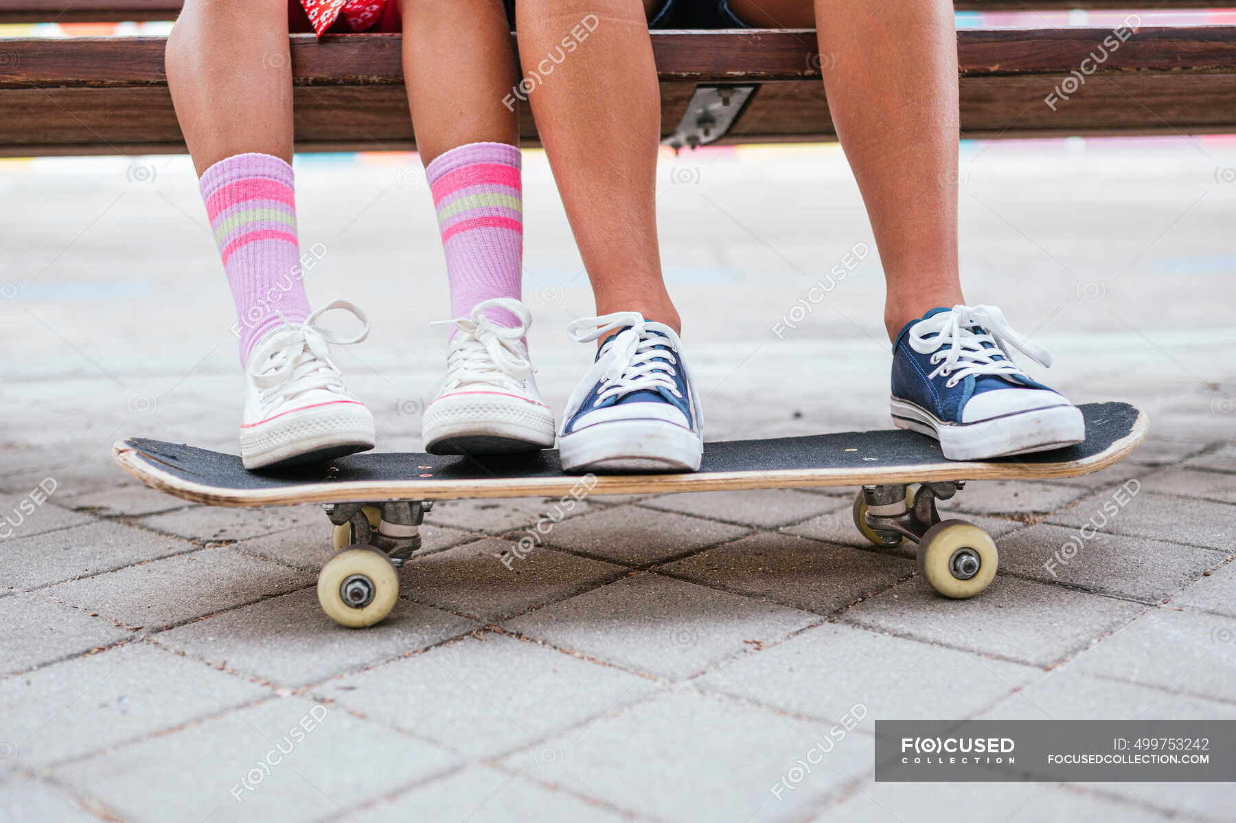 Correctie verkrachting catalogus Friends with skateboard sitting on bench — socks, male - Stock Photo |  #499753242
