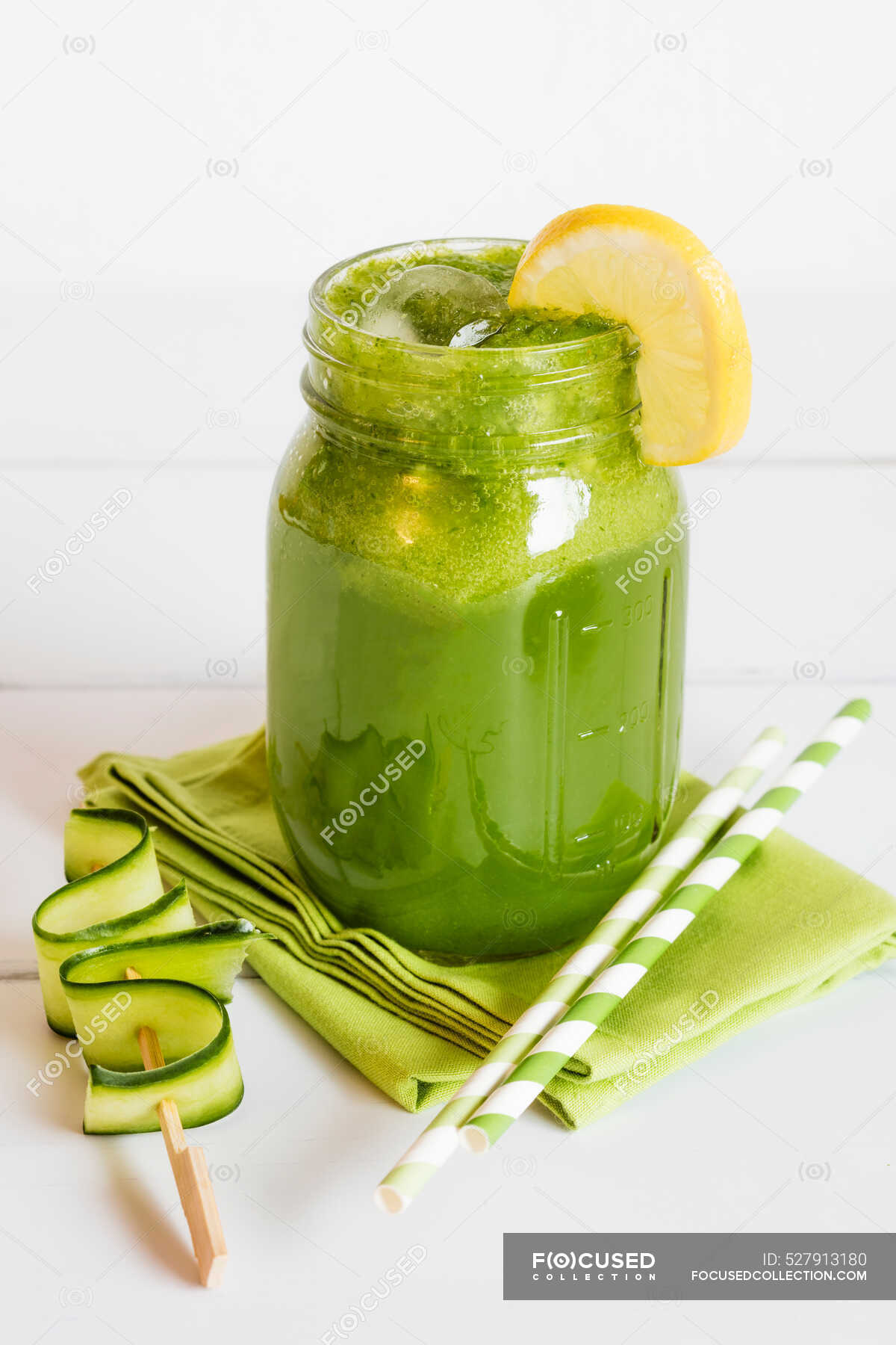 Mango, corn salad and cucumber smoothie with slice of lemon — fruit,  interiors - Stock Photo | #527913180