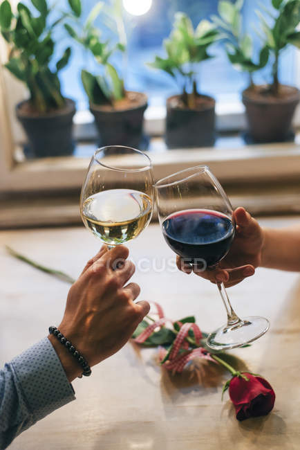 Couple toasting with wine — Stock Photo