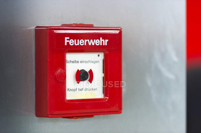 Fire alarm at wall — Stock Photo