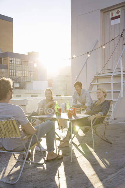 Friends having rooftop party — Stock Photo