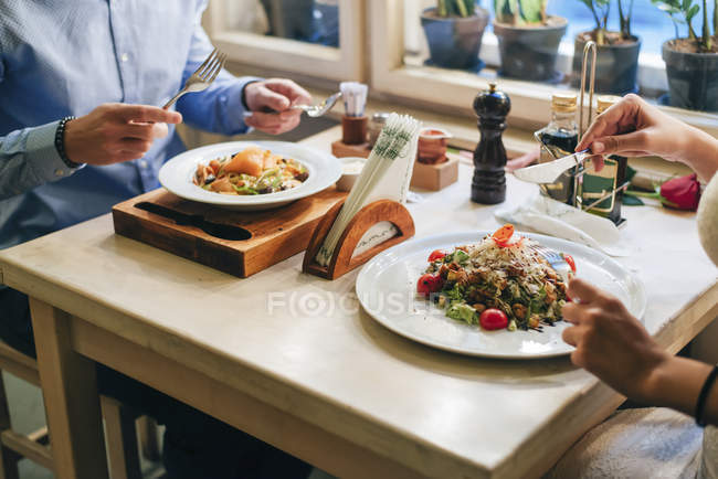 Couple having dinner in restaurant — Stock Photo