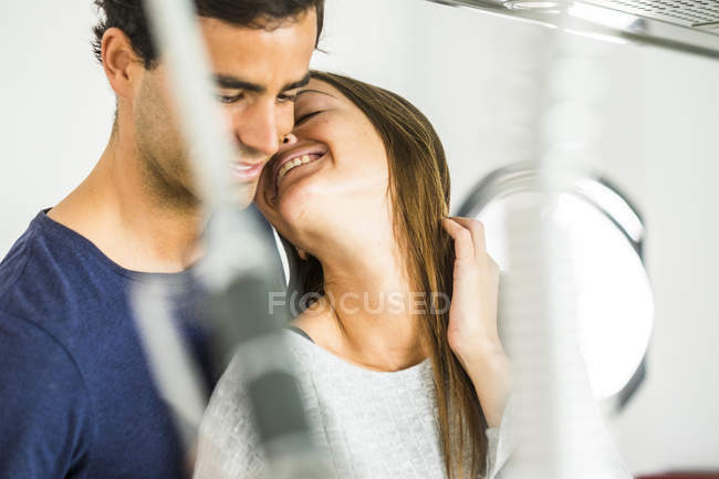 Couple hugging at home — Stock Photo