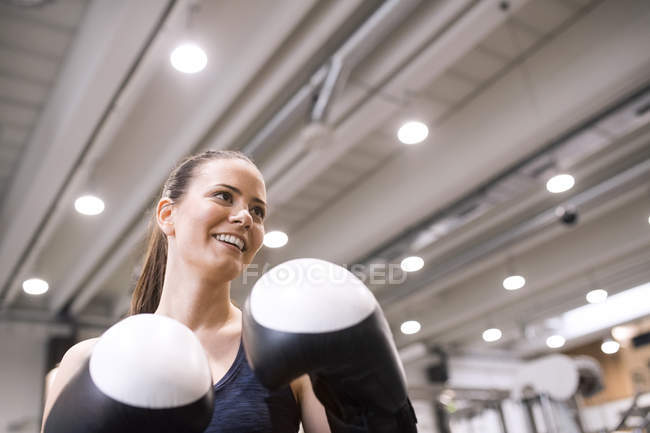 Woman boxing in gym — Stock Photo