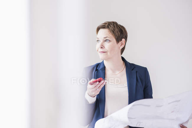 Real estate agent holding plan — Stock Photo