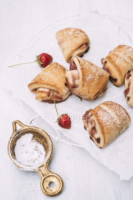 Close up of Strawberry buns with sugar powder — Stock Photo