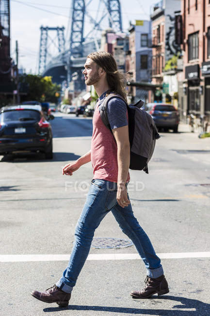 Portrait of mid adult man walking at street — Stock Photo