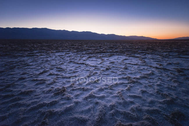 usa california death valley badwater basin at twilight mountain