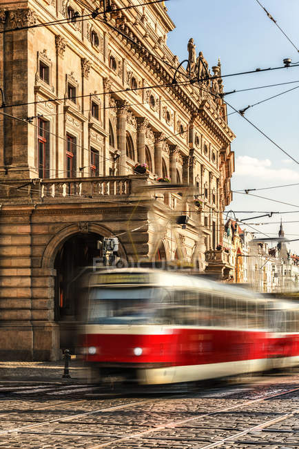 Czechia, Prague, driving tramway in front of traditional building — Stock Photo