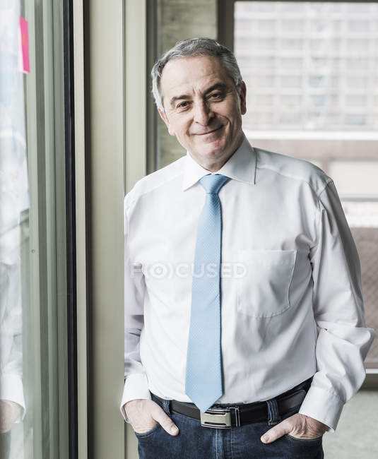 Manager standing in office — Stock Photo
