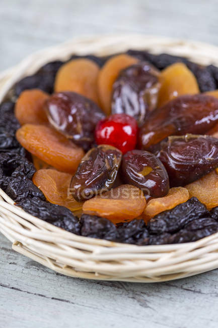 Various dried fruits in basket — Stock Photo