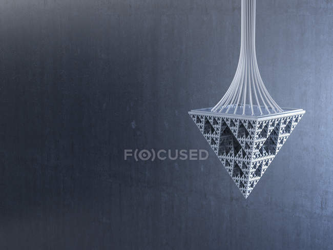 Pendolo fatto di triangoli su sfondo grigio — Foto stock