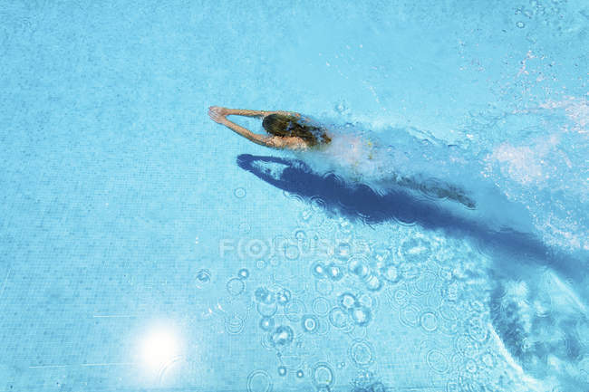 Woman Diving Underwater In Swimming Pool Stock Photo Woman Diving Underwater In Swimming Pool Stock Photo