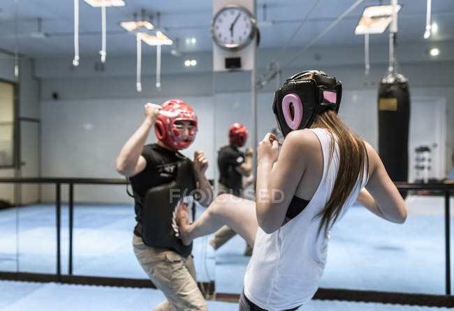 Young Woman In Gym Doing Self Defense Training Head Guard Caucasian Appearance Stock Photo