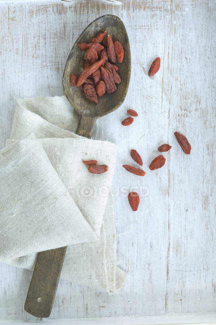 Dried Wolfberries on wooden spoon — Stock Photo