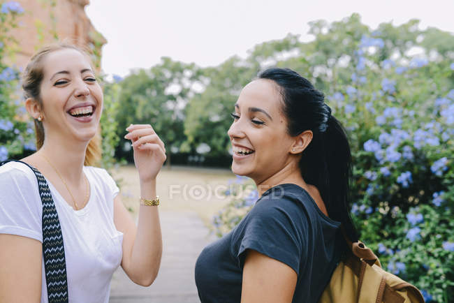 two people laughing together