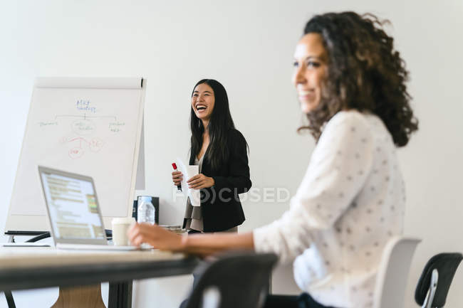 Business people having a team meeting in office — Stock Photo
