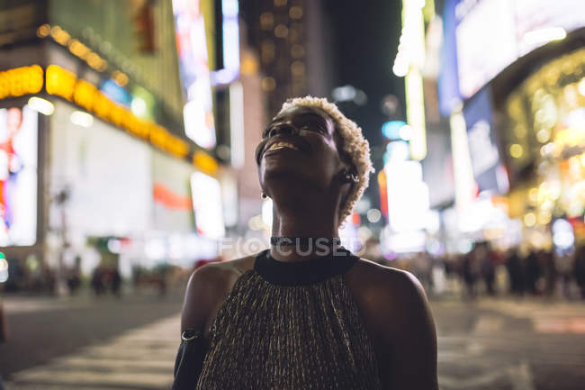 new york city people walking at night