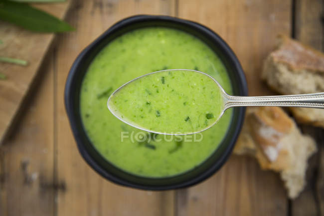 Top view of Spoon of bear garlic soup — Stock Photo