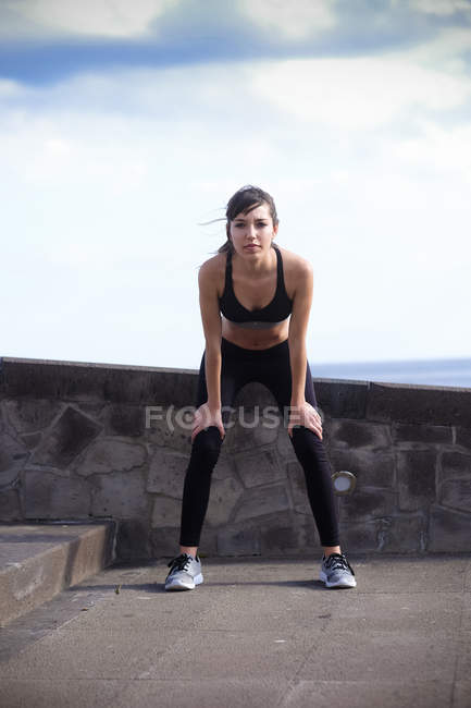 Portrait of young woman doing workout — Stock Photo