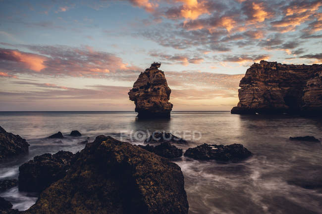 Portugal Algarve Albufeira Rock Formation At Sunset Clouds Scenics Stock Photo 177222400