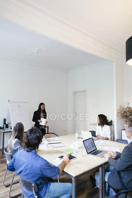 Business people having a team meeting in office — Stock Photo