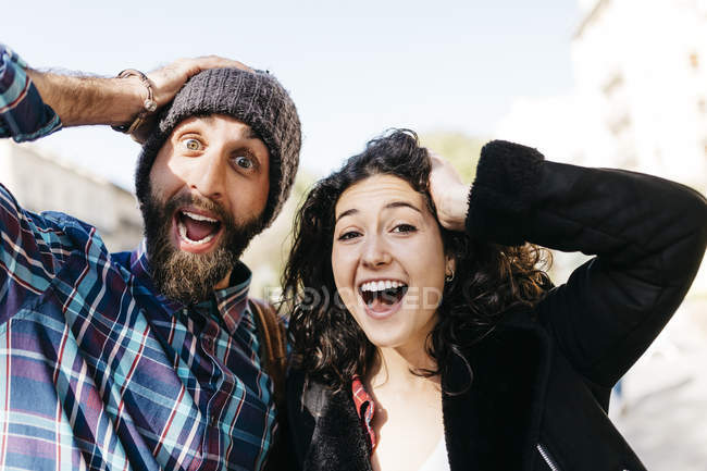 Couple pulling faces — Stock Photo