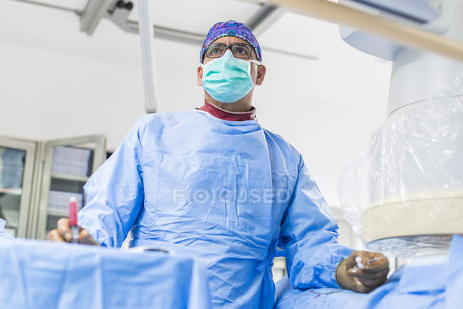 Portrait of male interventional radiologist at surgery — Stock Photo