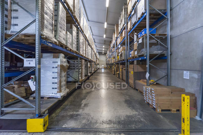 High rack warehouse with packed products — Stock Photo