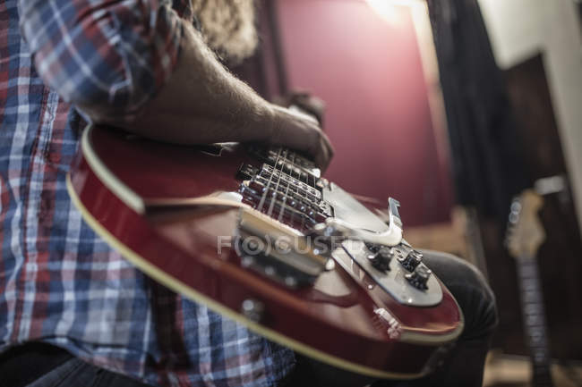 Close Up Of Man Playing Electric Guitar One Person Part Of Stock Photo