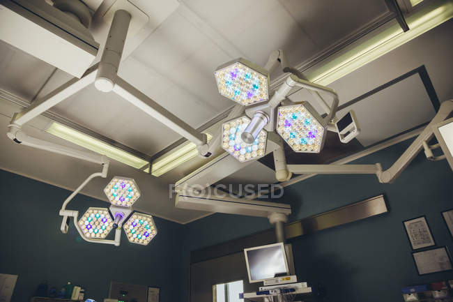 Bright Lights Above Operating Room Table Color Image Healthcare Bright Lights Above Operating Room Table Stock Photo
