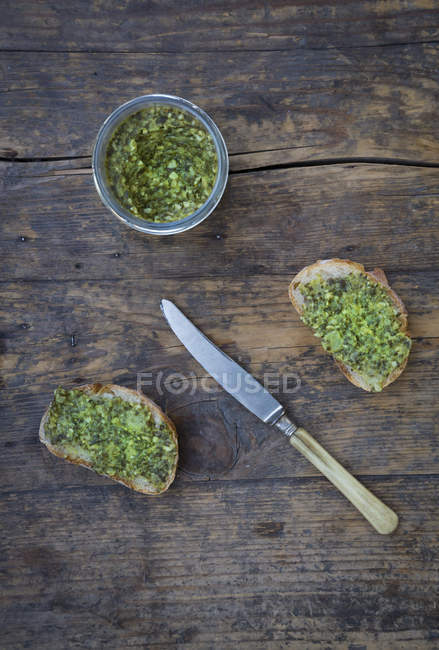 Top view of slices of bread with olive spread — Stock Photo