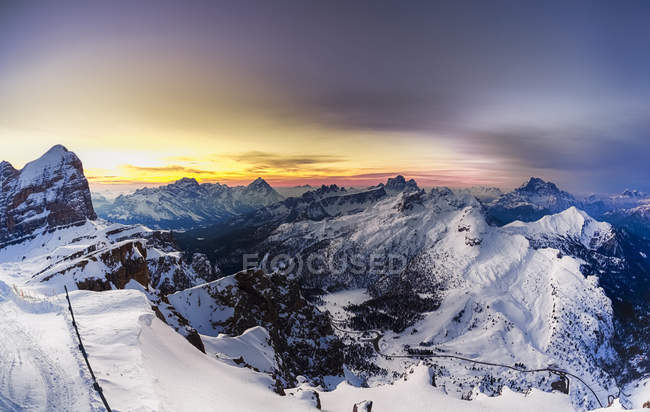 Italian Alps in winter at sunset over peak with snow — Stock Photo