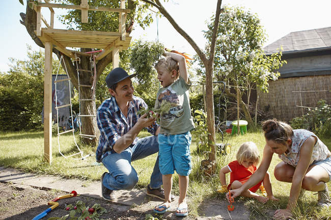 focused_179050318-Happy-family-playing-g