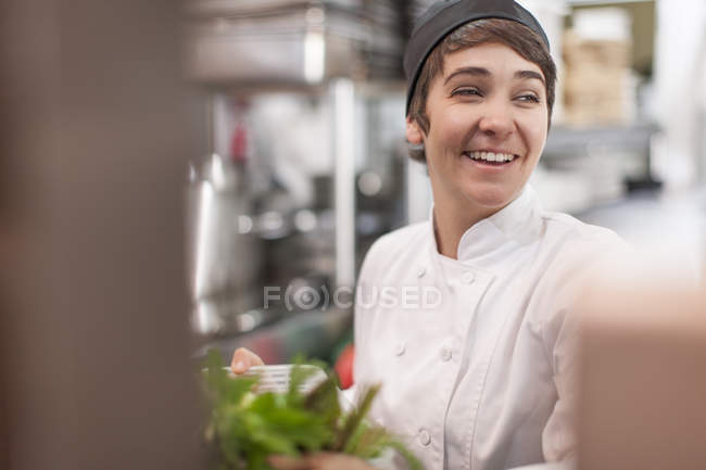Young chef in commercial litchen — Stock Photo