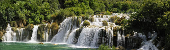 Natural landscape with waterfall — Stock Photo