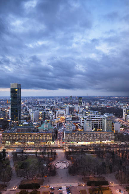 Aerial view of city centre at evening twilight, Warsaw, Poland — Stock Photo