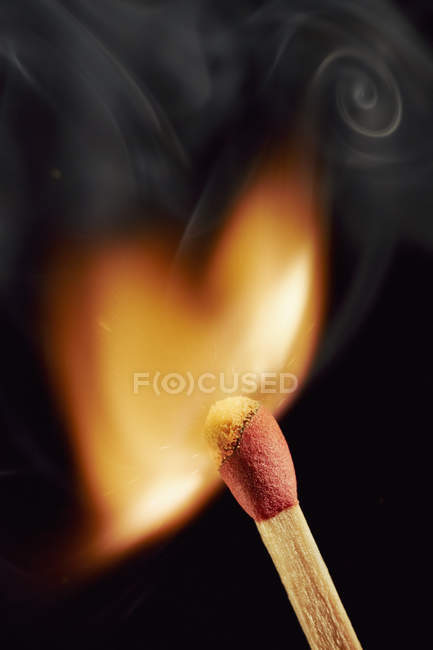 Burning matchstick on black background — flame, plain background - Stock  Photo | #180092754