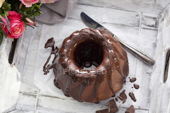 Ring cake with chocolate icing — Stock Photo