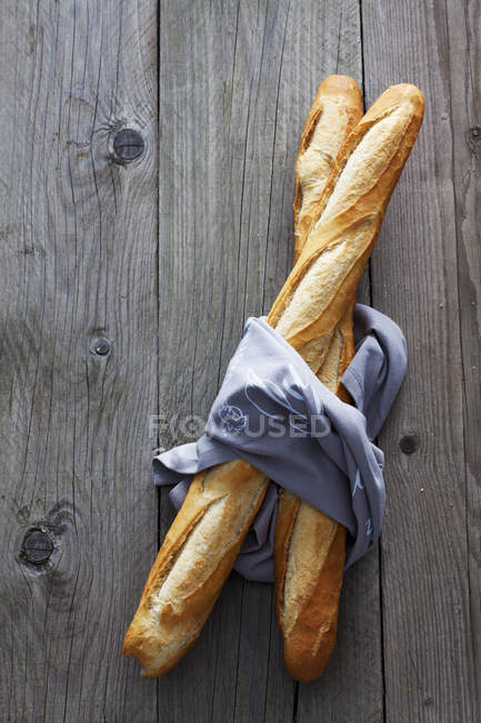 French baguettes and cloth — Stock Photo