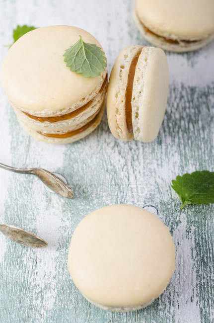 French macarons filled with caramel — Stock Photo