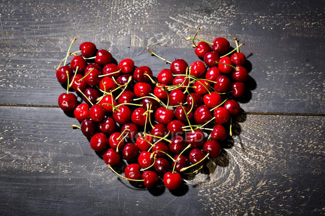 Cherries shaped heart — Stock Photo