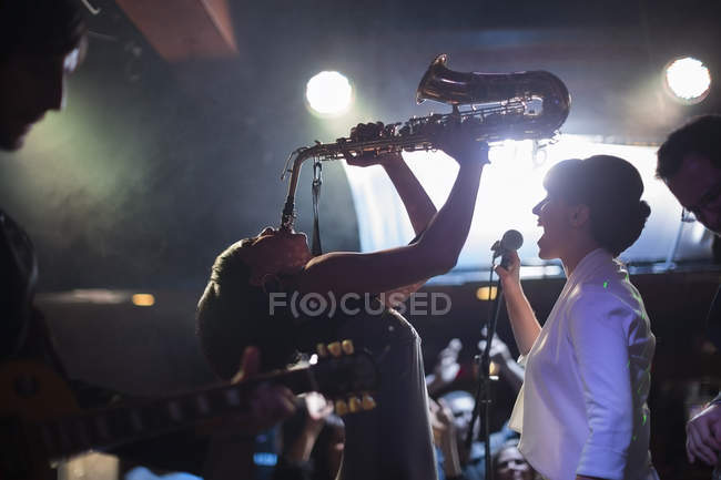Jazz band singing and playing on stage — Stock Photo