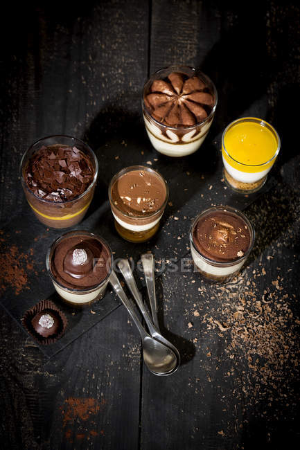Glasses with different sorts of desserts — Stock Photo