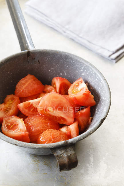 Quartered and skinned tomatoes — Stock Photo
