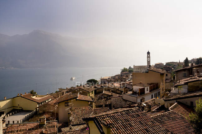 Italy, Lombardy, Brecia, Limone sul Garda, View over rooftops of the city — Stock Photo
