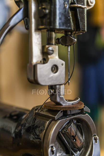 Leather sewing machine on blurred background, close up — Stock Photo