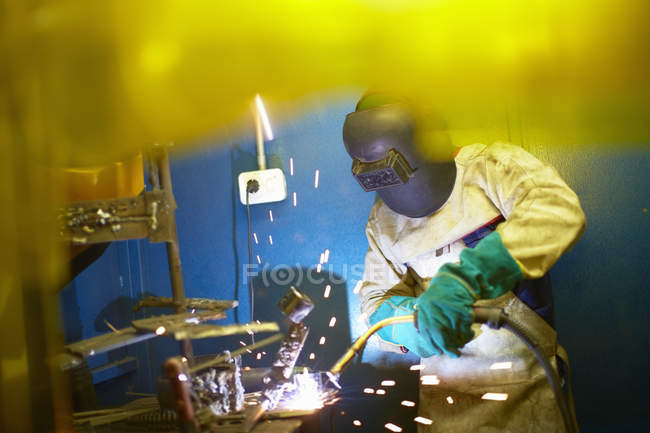 Closeup of welder at work on factory — Stock Photo