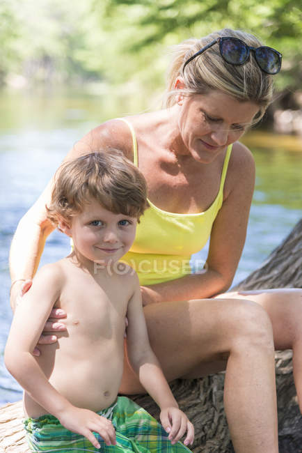 USA, Texas, Boy with his mother at the Frio Riverr — Stock Photo